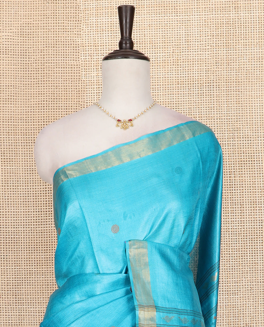 Red rudraksha buttas tussar saree, zari border, and pallu of meena buttas