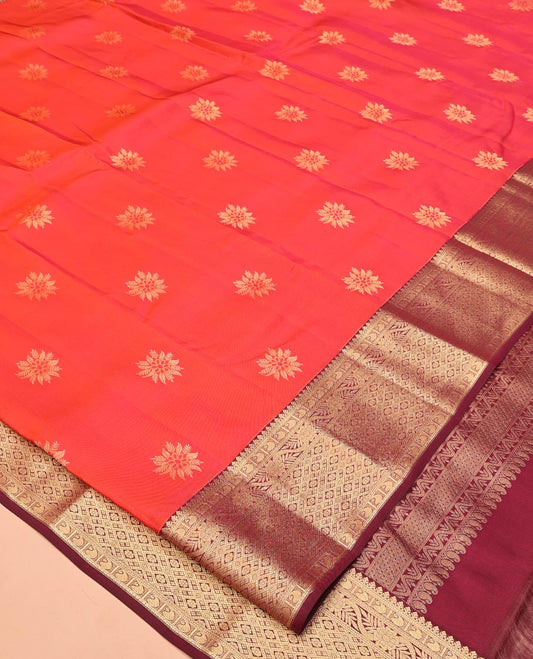 Orange Vasundhara Lite Silk Mix Saree, Accentuated With Zari Buttas All Over Its Body, Complemented by Contrast Traditional Zari Designs Woven Border of Manga, Floral, and Jaal Designs, Grand Jaal Pallu and Paired with a Contrast Blouse