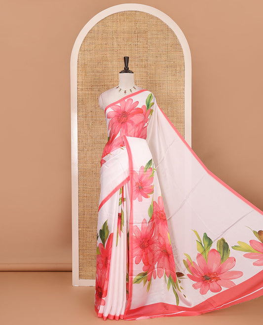 Cream base digital printed satin crepe saree with big pink floral motifs all over the saree, plain pink border & blouse