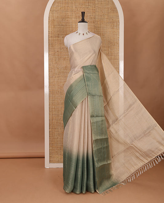 Borderless sandal-green plain ombre-colored tissue saree, plain pallu & circle motifs printed blouse