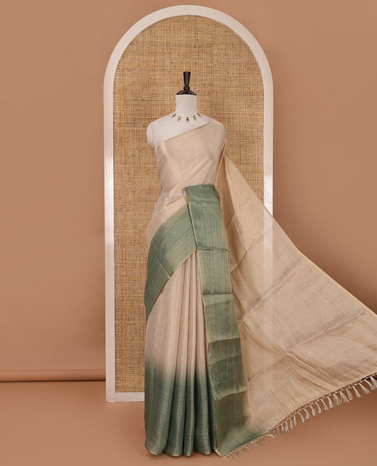 Borderless sandal-green plain ombre-colored tissue saree, plain pallu & circle motifs printed blouse
