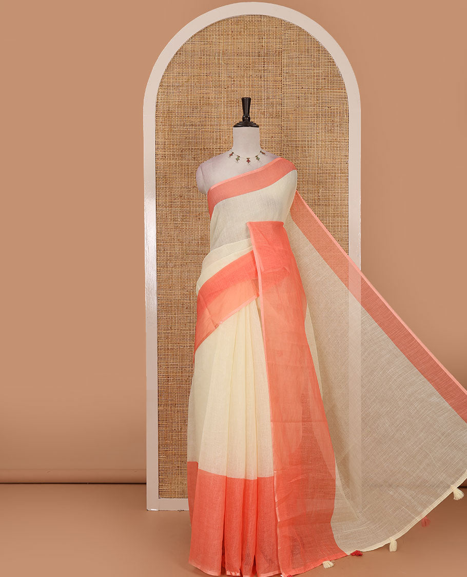 Cream full-plain linen saree, contrast big plain pink border & plain pallu & buttas printed matching blouse