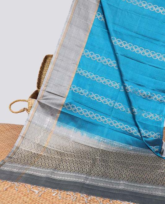Blue  intricate design soft silk saree with contrast striped border & leaf design pallu