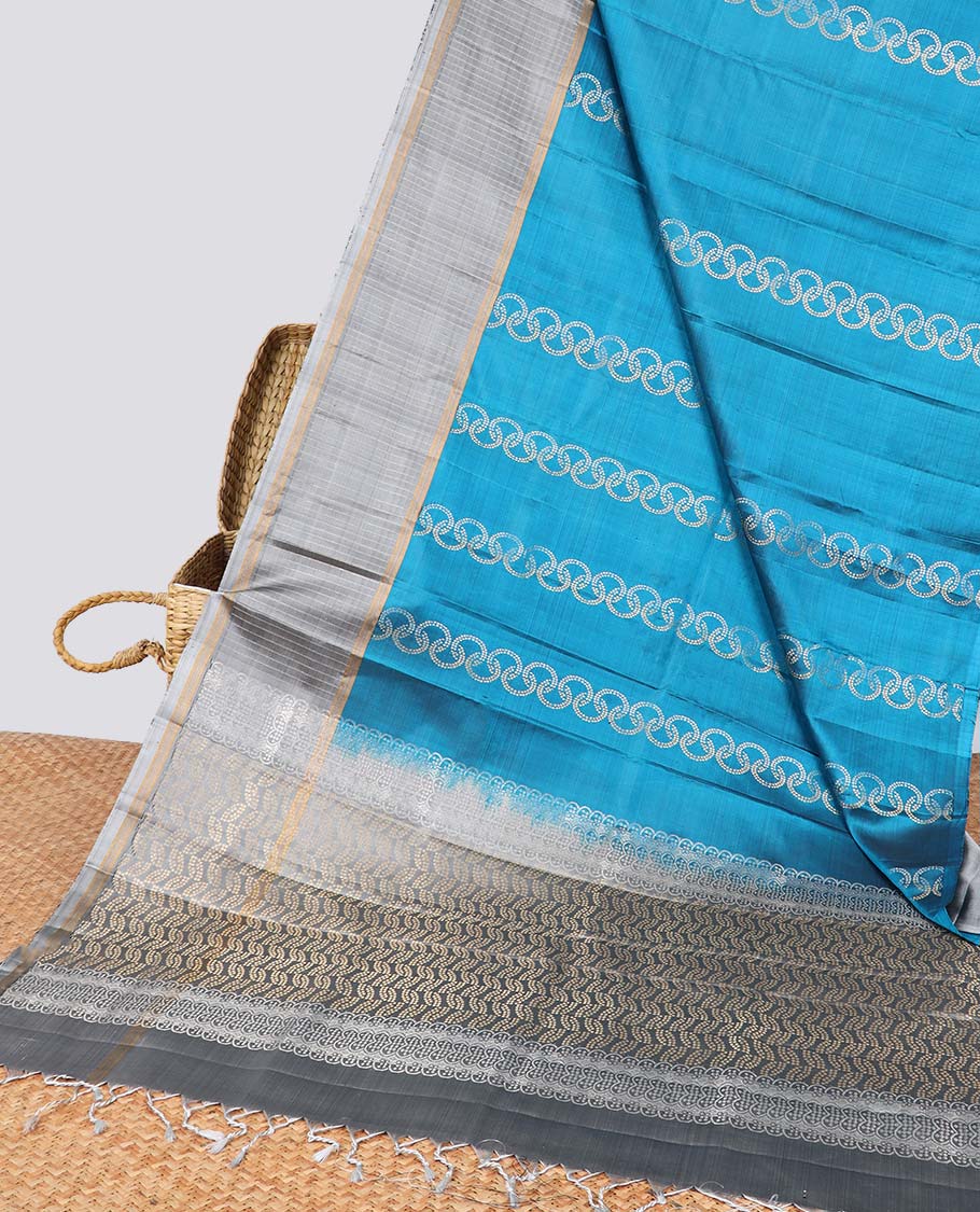 Blue  intricate design soft silk saree with contrast striped border & leaf design pallu