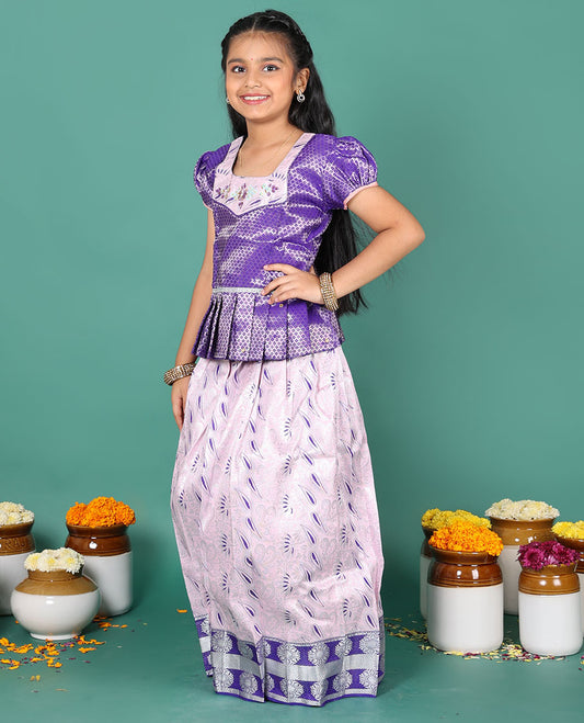 Baby pink readymade art silk pavadai, meenakari jacquard & contrast chakram zari border skirt, and contrast jacquard embroidered puff-sleeve blouse