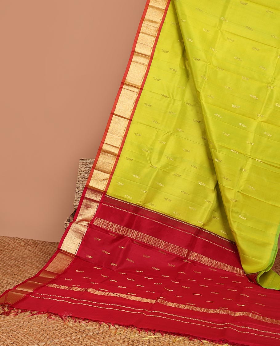 Green  floral buttas kancheepuram silk saree with contrast border of sombu,banaras,jaal design & zari design pallu