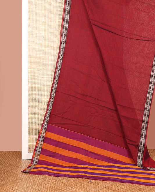 Maroon Plain Narayanpet Cotton Saree, Complemented by a Traditional Thread Border of Paisley Designs, Vibrantly Striped Pallu, and Paired with a Matching Blouse