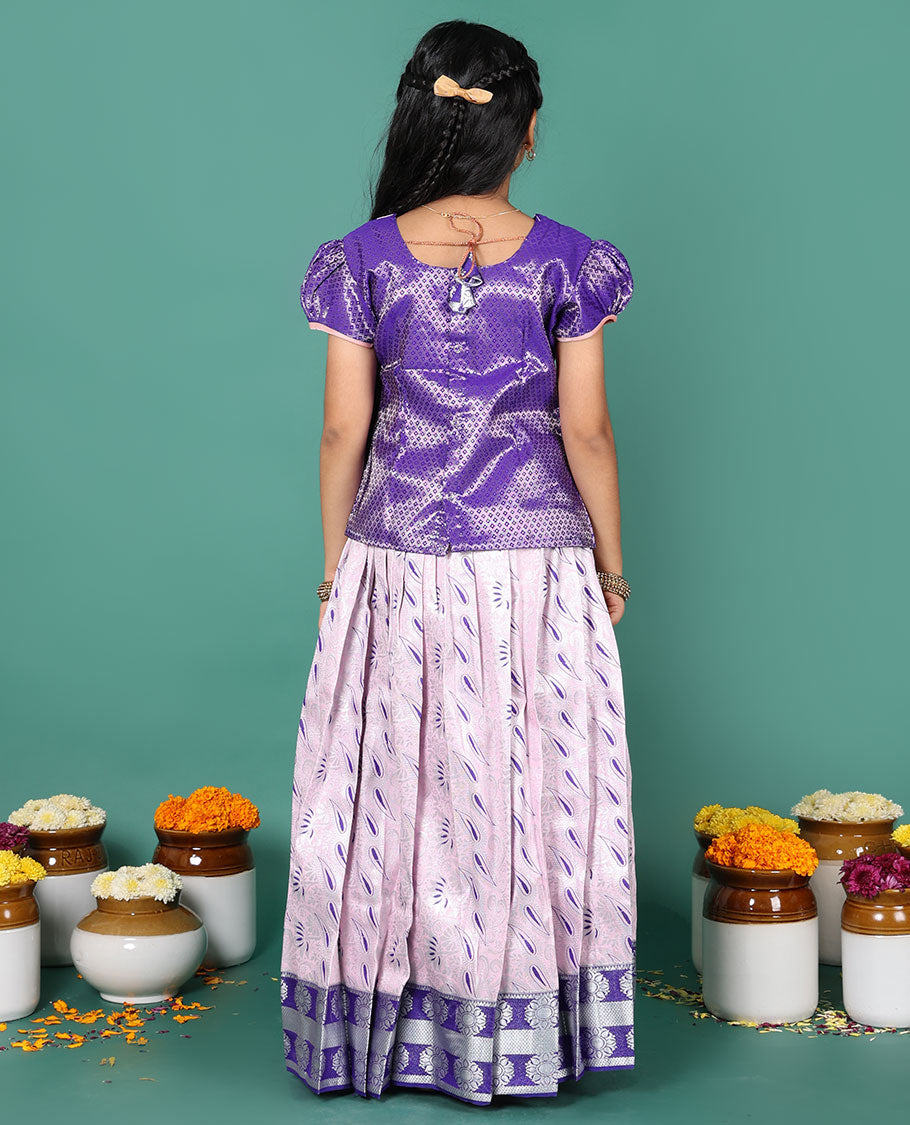 Baby pink readymade art silk pavadai, meenakari jacquard & contrast chakram zari border skirt, and contrast jacquard embroidered puff-sleeve blouse