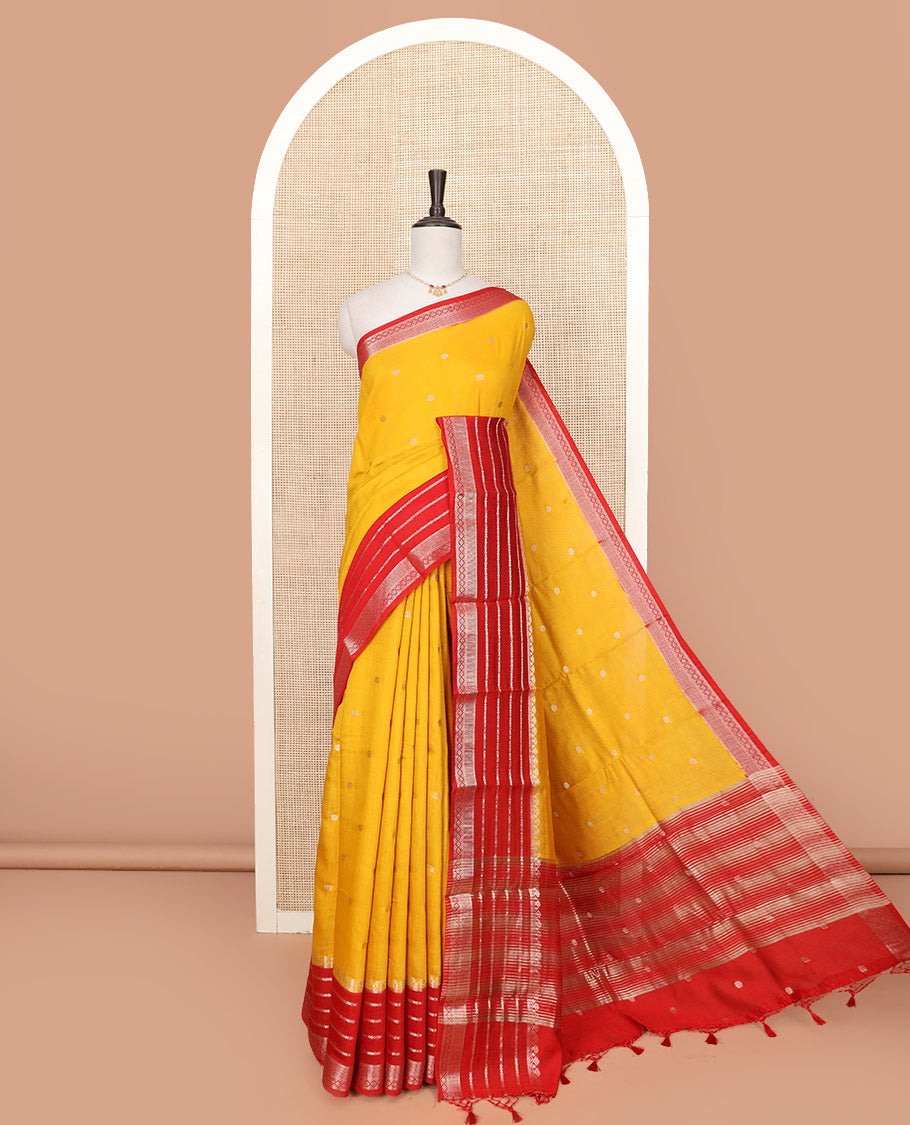 Yellow Assam Silk Saree Graced with Floral Zari Buttas, Complemented by a Contrast Traditional Zari Border, a Captivating Pallu of Zari Designs, and Paired with a Contrast Blouse