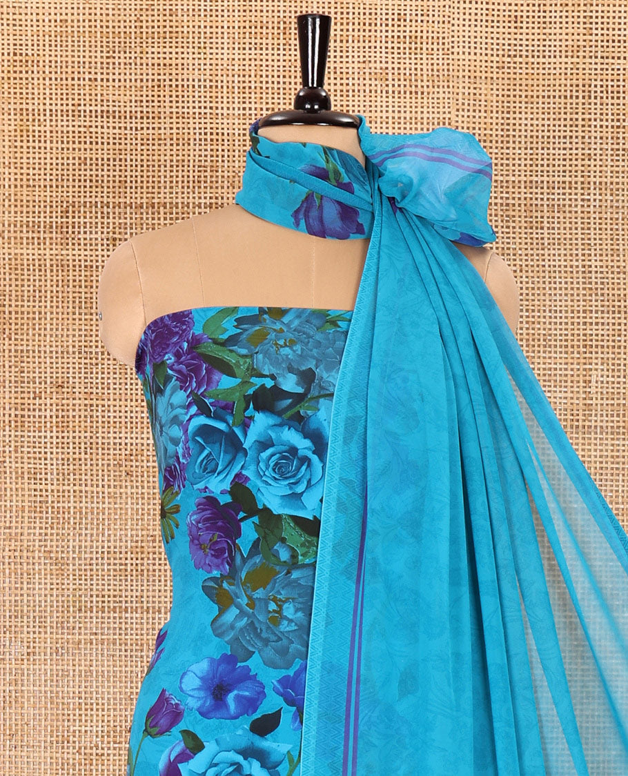 Rama green material chudidar set, realistic floral-printed Italian crepe top, a plain bottom, and a floral-printed georgette dupatta