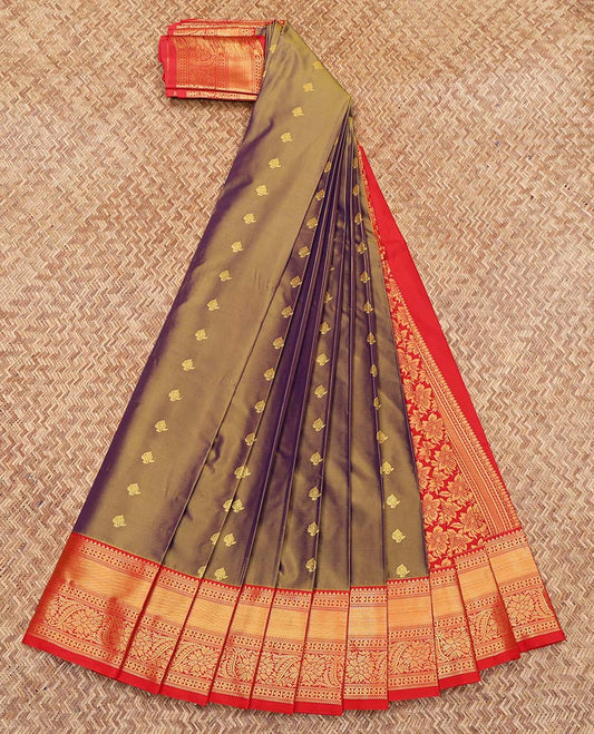 Green Budget Silk Saree, Elegantly Framed with Zari Buttas on Its Body, Complemented by a Contrast Traditional Zari Design Border, Grand Flower Design Pallu, and Paired with a Contrast Blouse