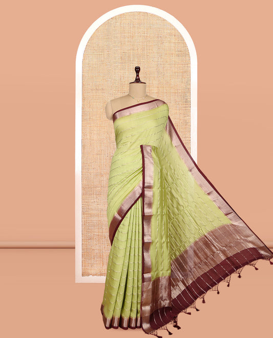 Green Assam Silk Saree, Enriched with Zari Stripes, Complemented by Contrast Zari Border,  Zari Woven Pallu, and Contrast Blouse