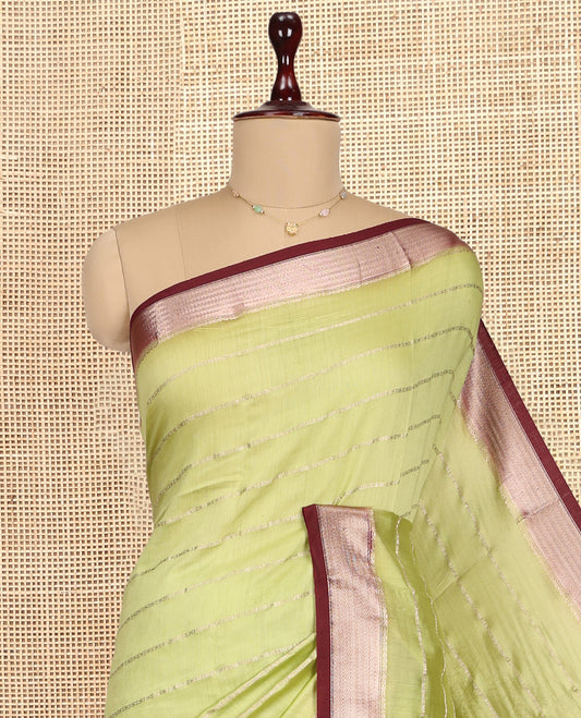 Green Assam Silk Saree, Enriched with Zari Stripes, Complemented by Contrast Zari Border,  Zari Woven Pallu, and Contrast Blouse