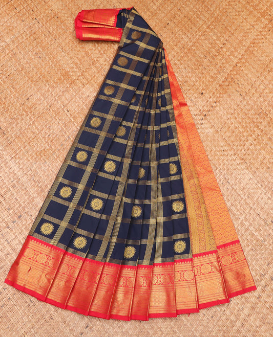 Navy Blue Budget Silk Saree, Bedecked with Zari Butta Enclosed Checks on Its Body, Complemented by a Contrast Traditional Zari Design Border, Grand Jaal Pallu, and Paired with a Contrast Blouse