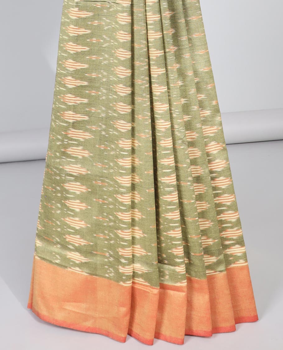 Green floral design ikkat cotton saree with contrast border & intricate design pallu
