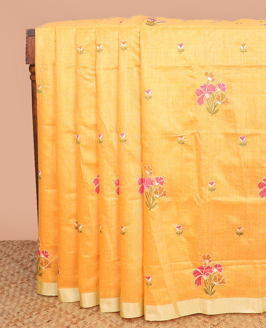 Mango yellow floral thread embroidered Chirala cotton saree, bavanji border, and kolam motif pallu