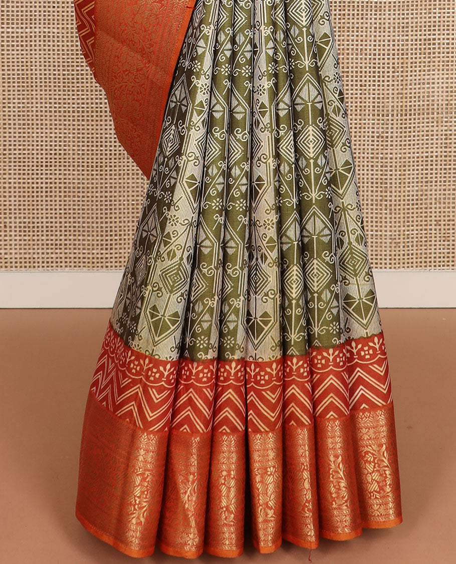 Olive green intricately designed semi-banaras patola silk saree, contrast floral creeper zari design border, and pallu of chevron and floral designs