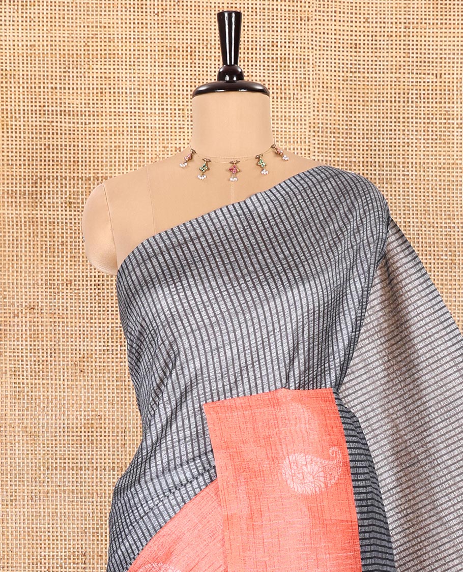Grey and Rama Semi-Tussar Saree Enriched with Vertical Stripes Printed Across the Body, Featuring a Contrast Paisley Motif Printed Border, an Intricately Designed Pallu of Jaal Design, and Paired with a Contrast Blouse
