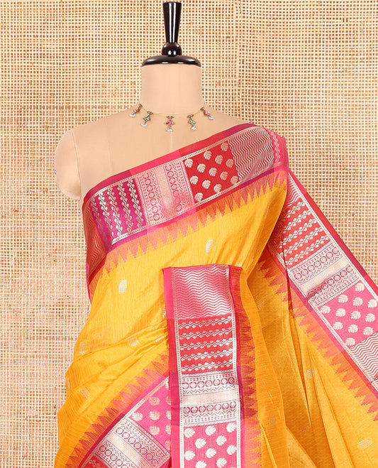 Yellow Semi-Raw Silk Saree, Accentuated with Buttas All Over Its Body, Complemented by Contrast Meenakari-Style Woven Border of Geometric Zari Designs, Majestically Detailed Pallu, and Paired with a Contrast Blouse