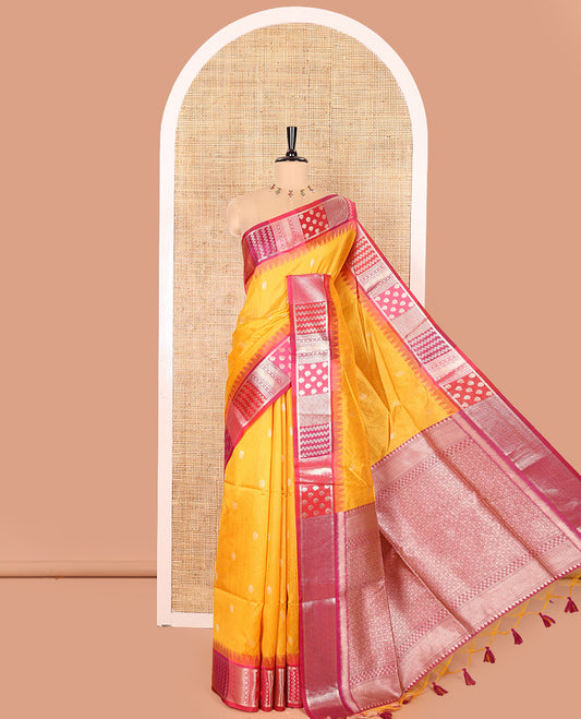 Yellow Semi-Raw Silk Saree, Accentuated with Buttas All Over Its Body, Complemented by Contrast Meenakari-Style Woven Border of Geometric Zari Designs, Majestically Detailed Pallu, and Paired with a Contrast Blouse