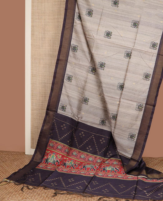 Grey zari buttas and elephant motifs tussar silk saree, contrast bavanji border, and patola style elephant motifs printed pallu