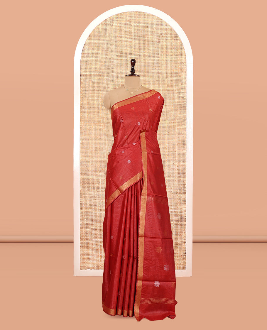 Red Tussar Saree, Beautified with Buttas, a Subtle Zari Border, Pallu of Intricate Designs, and a Matching Blouse