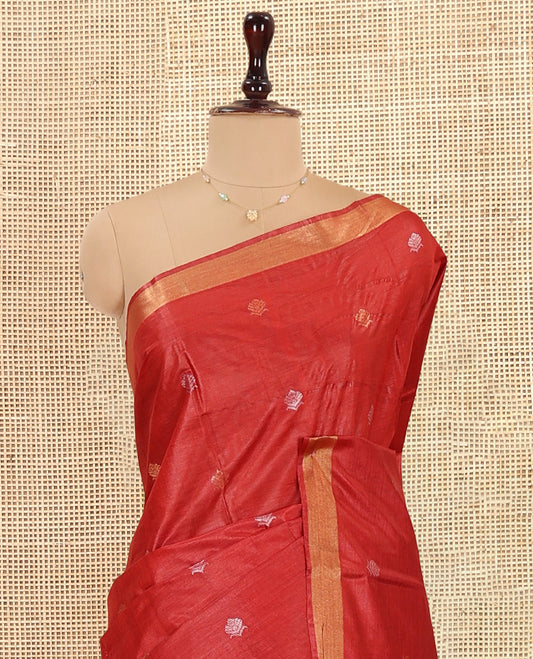 Red Tussar Saree, Beautified with Buttas, a Subtle Zari Border, Pallu of Intricate Designs, and a Matching Blouse
