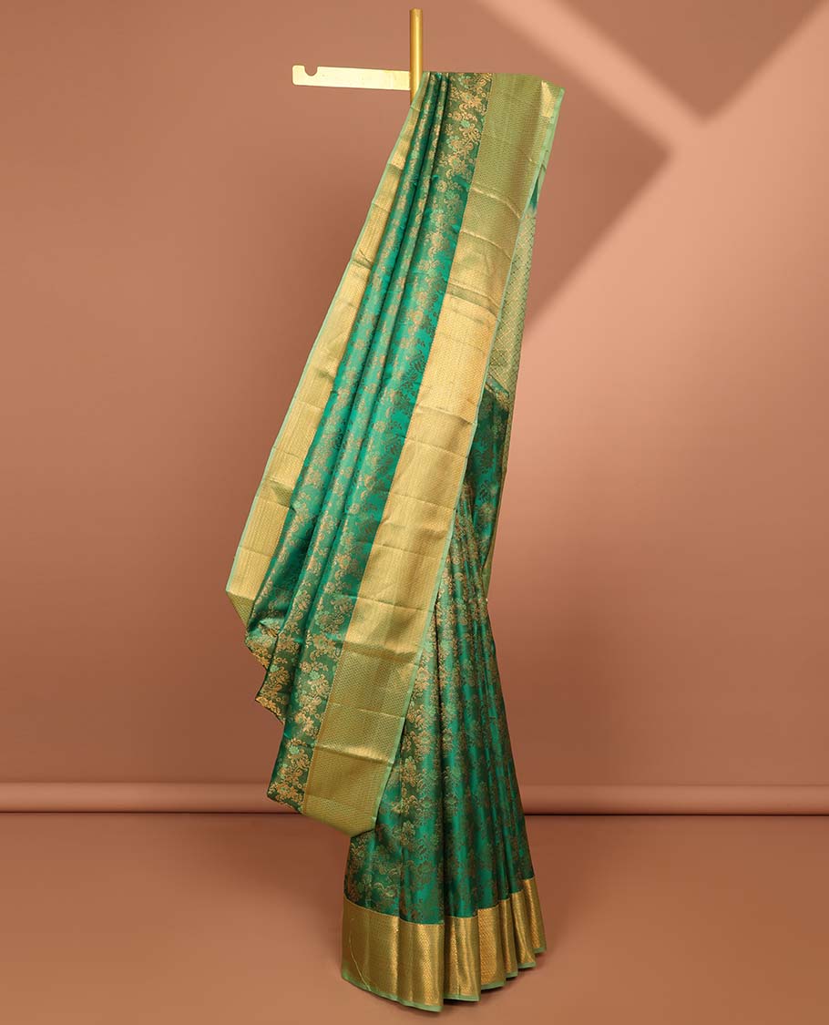 Green floral jacquard kancheepuram silk saree with contrast checked zari border & pallu of argyle pattern
