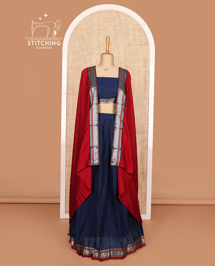 Navy blue cotton half-saree, plain with contrast geometric bordered skirt, matching blouse, and contrast geometric bordered dhavani