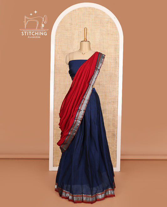 Navy blue cotton half-saree, plain with contrast geometric bordered skirt, matching blouse, and contrast geometric bordered dhavani