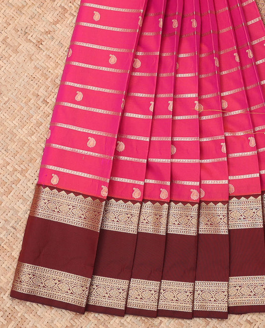 Pink Budget Silk Saree, Detailed with Zari Stripes and Paisley Buttas, a Contrast Traditional Zari Rettai Pettu Border, Grand Pallu, and a Contrast Blouse