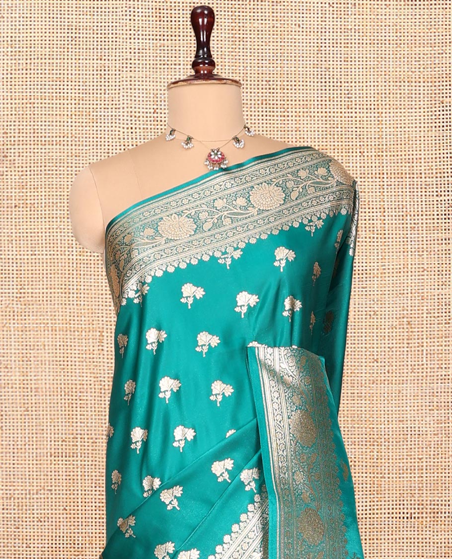 Green Banarasi Nylon Saree, Bedecked with Buttas, Floral Creeper Zari Border, Intricate Pallu, and a Matching Blouse