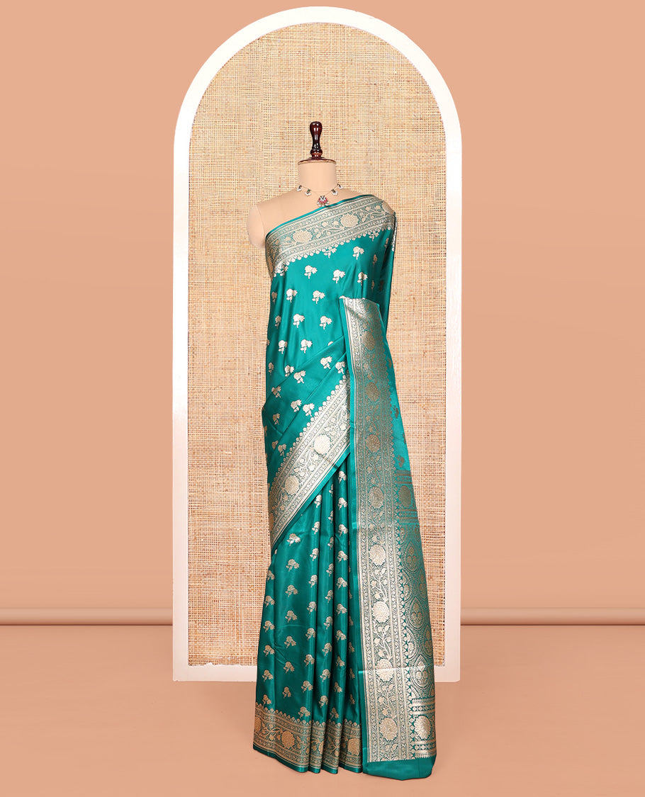 Green Banarasi Nylon Saree, Bedecked with Buttas, Floral Creeper Zari Border, Intricate Pallu, and a Matching Blouse