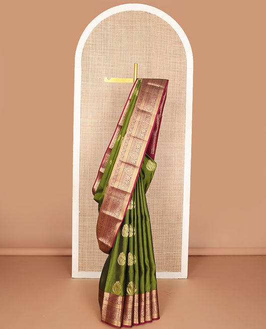 Green zari buttas vasundhara silk mix saree, contrast border of rekku,muthu,then kuli kann & dhavana kodi designs & floral design pallu