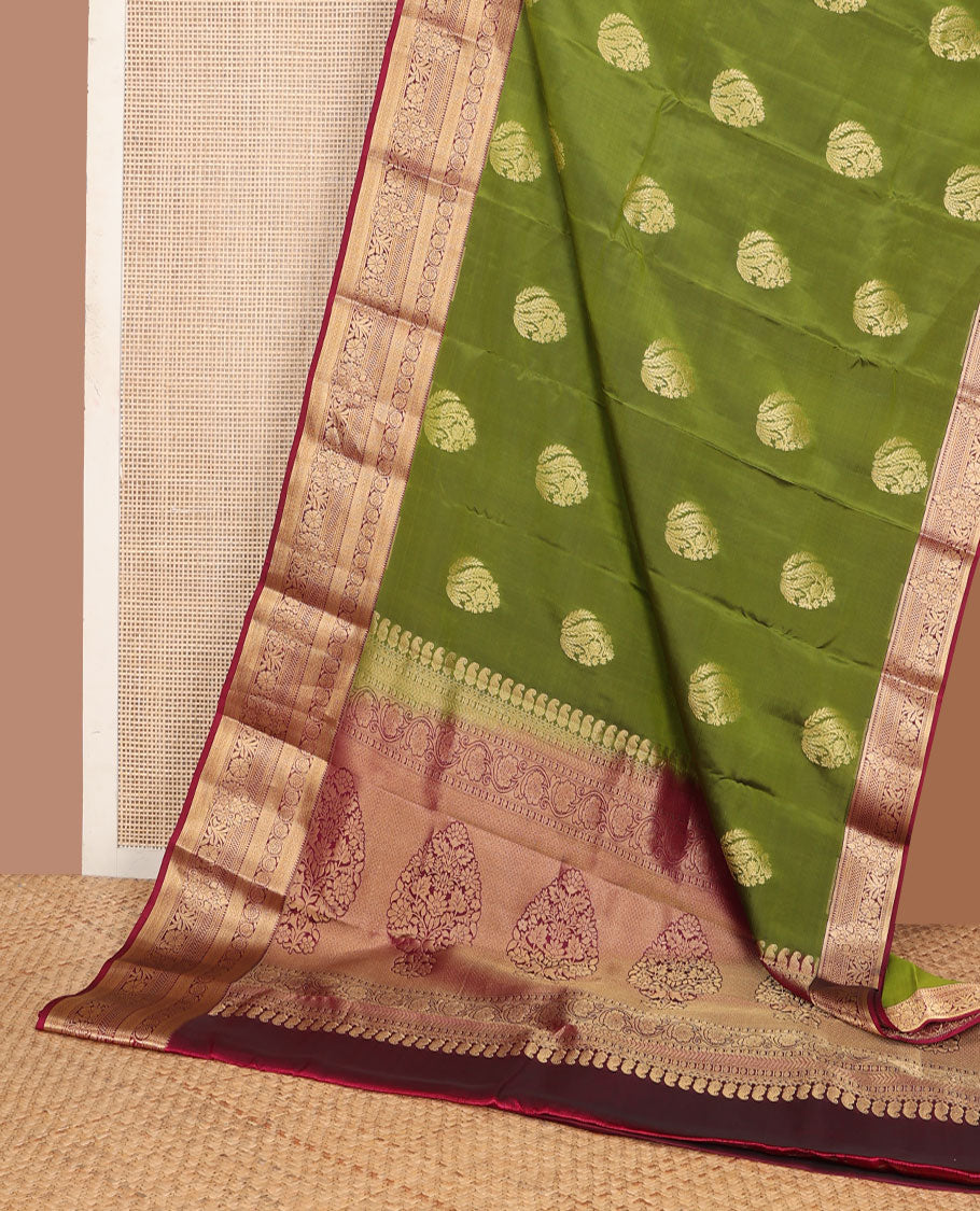 Green zari buttas vasundhara silk mix saree, contrast border of rekku,muthu,then kuli kann & dhavana kodi designs & floral design pallu