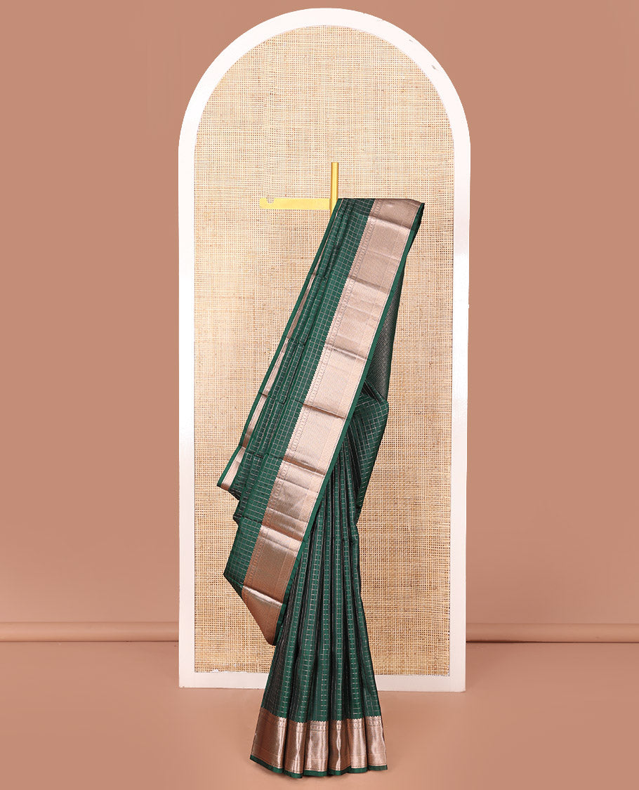 Green Vasundhara Silk Saree Beautifully Bedecked with Checks, Highlighted by a Zari Border of Rudraksham, Ara Maadam, and Mayil Kann Designs, Delicately Woven Geometric Patterned Pallu, and Paired with a Matching Blouse