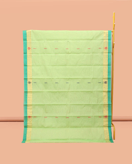 Green Kanchi Cotton Saree, Adorned with Buttas, Complemented by a Contrast Border, Intricate Pallu, and a Matching Blouse