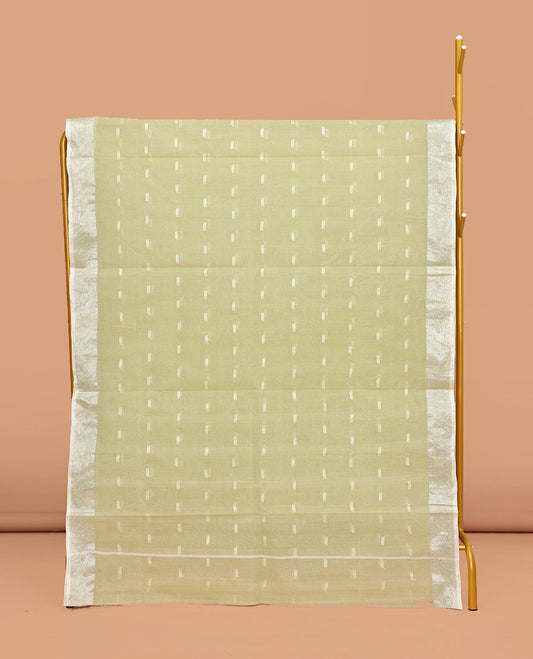 Pale Green Bengal Cotton Saree, Subtly Sparkled with Buttas All Over Its Body, Complemented by a Contrast Paisley Zari Design Border, Pallu of Stripes, and Paired with a Matching Blouse