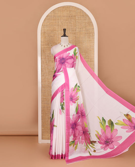 Cream base digital printed satin crepe saree with big baby pink floral motifs all over the saree, plain baby pink border & blouse
