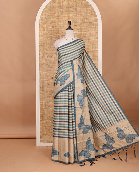 Blue horizontal stripes printed soft tussar saree adorned with big butterfly motifs printed border and pallu, contrast blouse