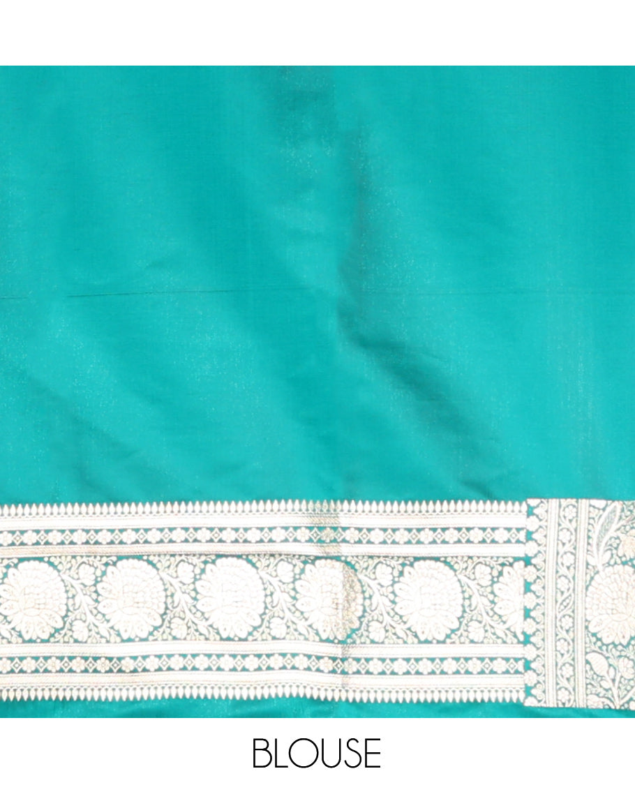Green Banarasi Nylon Saree, Bedecked with Buttas, Floral Creeper Zari Border, Intricate Pallu, and a Matching Blouse