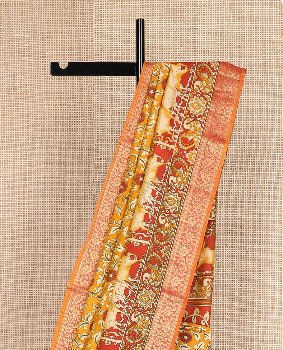 Orange floral vine patola silk saree, contrast traditional zari border and pallu of Pichwai cow and peacock motifs