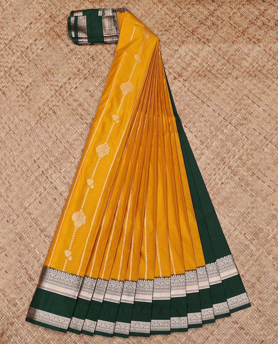 Yellow Budget Silk Saree, Decked Up with Zari Designs All Over Its Body, Complemented by a Contrast Traditional Zari Design Rettai Pettu Border, Intricate Pallu, and Paired with a Contrast Blouse