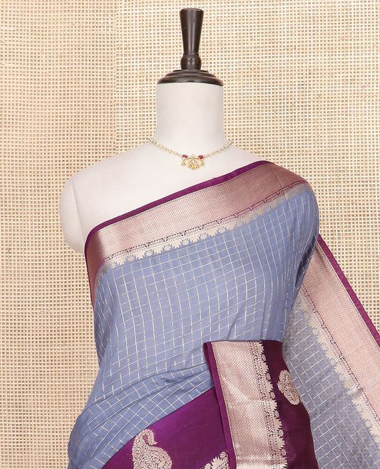 Grey zari checked Assam silk saree, contrast traditional zari border of paisleys, and pallu of zari stripes