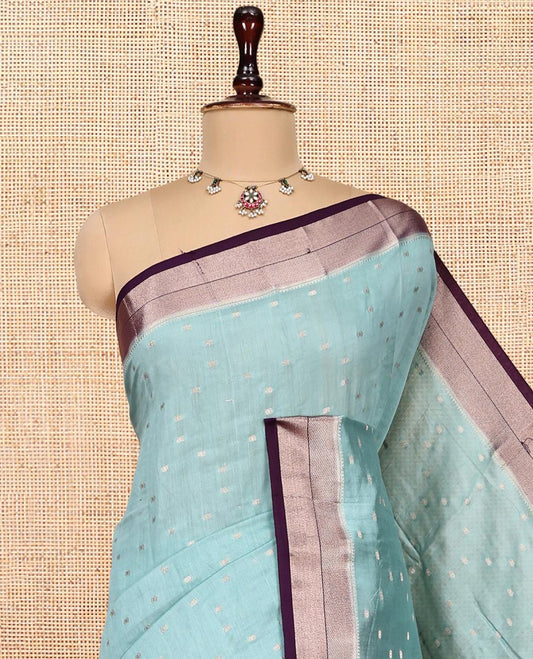 Pale Blue Assam Silk Saree, Ornamented with Zari Buttas, Complemented by a Contrast Zari Border, Zari-Design Pallu, and a Contrast Blouse