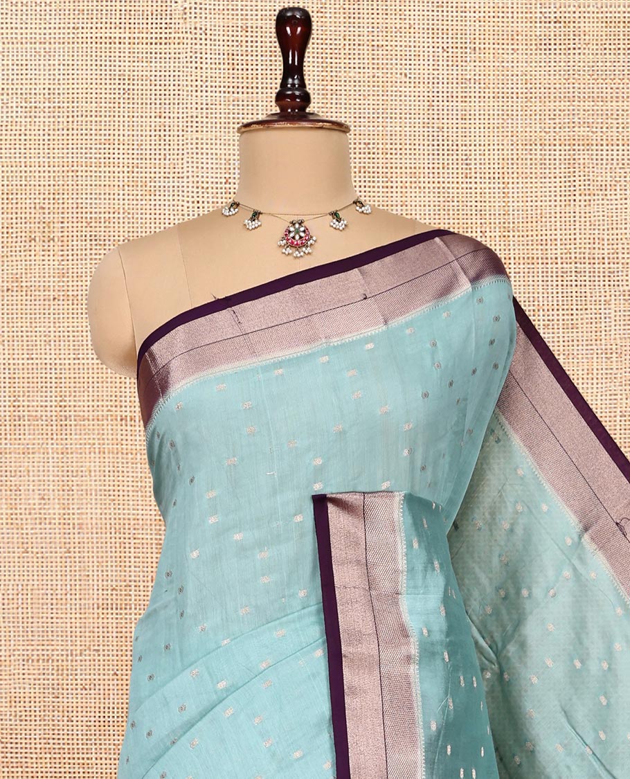 Pale Blue Assam Silk Saree, Ornamented with Zari Buttas, Complemented by a Contrast Zari Border, Zari-Design Pallu, and a Contrast Blouse