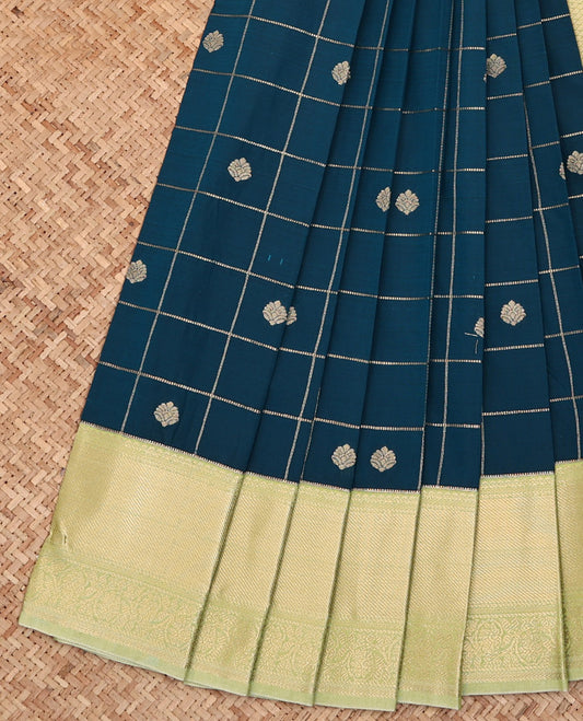 Blue Budget Silk Saree, Gleamed Up with Zari Butta Enclosed Checks All Over Its Body, Complemented by a Contrast Traditional Zari Design Border, Sparsely Sparkled Pallu, and Paired with a Contrast Blouse