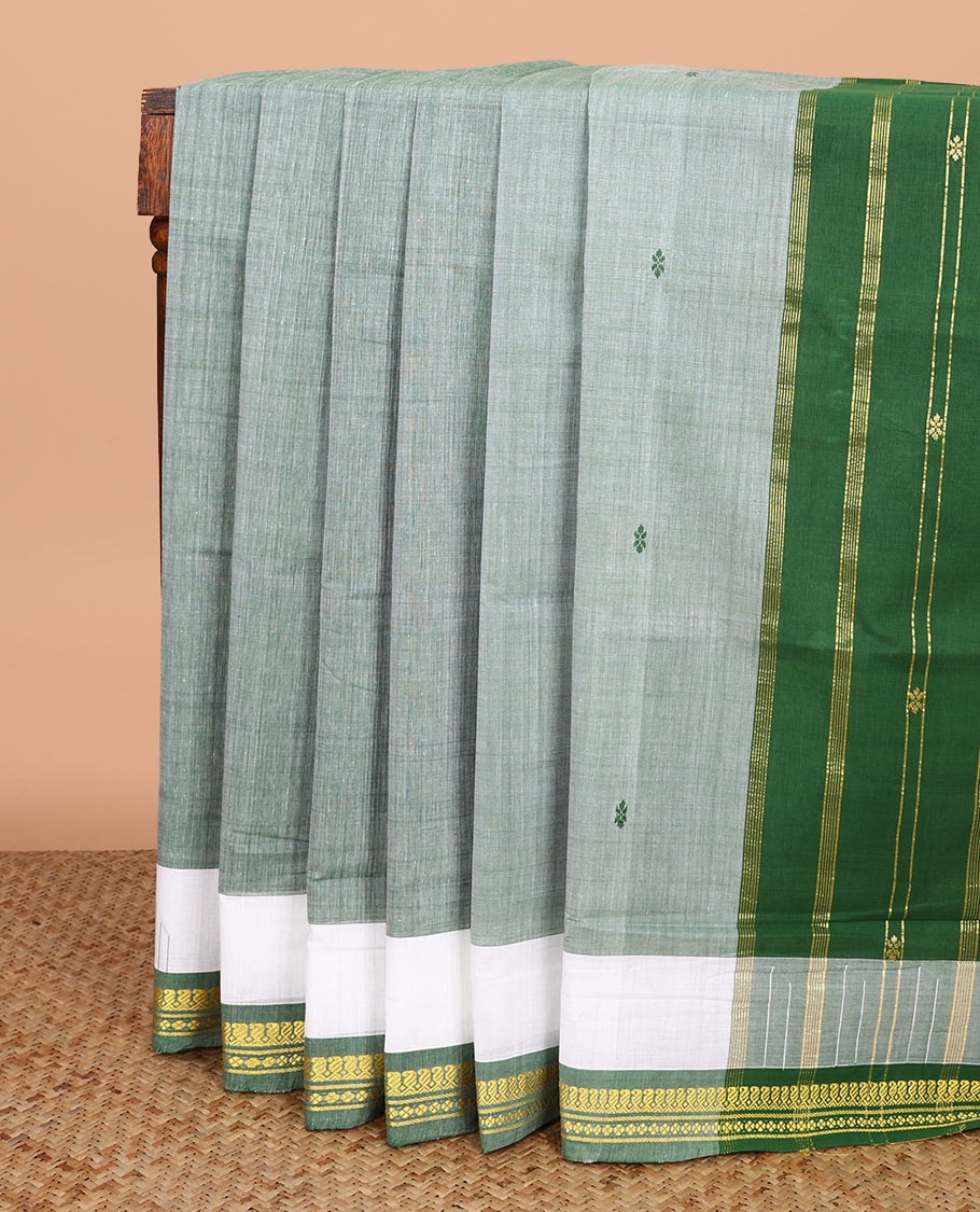 Light green buttas Andhra cotton saree, contrast traditional zari border, and pallu of zari stripes