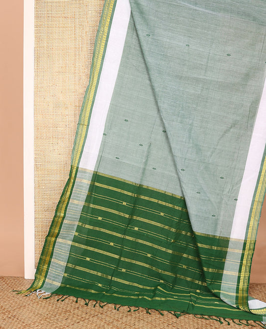Light green buttas Andhra cotton saree, contrast traditional zari border, and pallu of zari stripes
