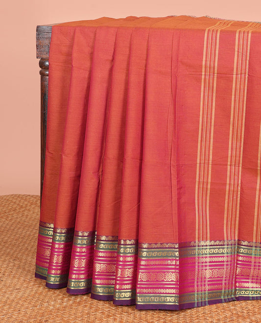 Rust Orange Plain Chettinad Cotton Saree, Highlighted  by a Contrast Traditional Zari Border, and a Pallu Steeped with Stripes